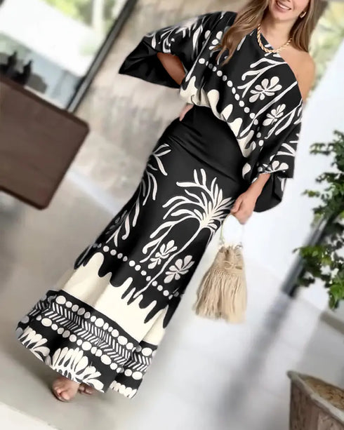 2 Pieces Outfit Tropical Print Lantern Sleeve Cold Shoulder Loose Top and Casual High Waist Fishtail Maxi Skirt Set black